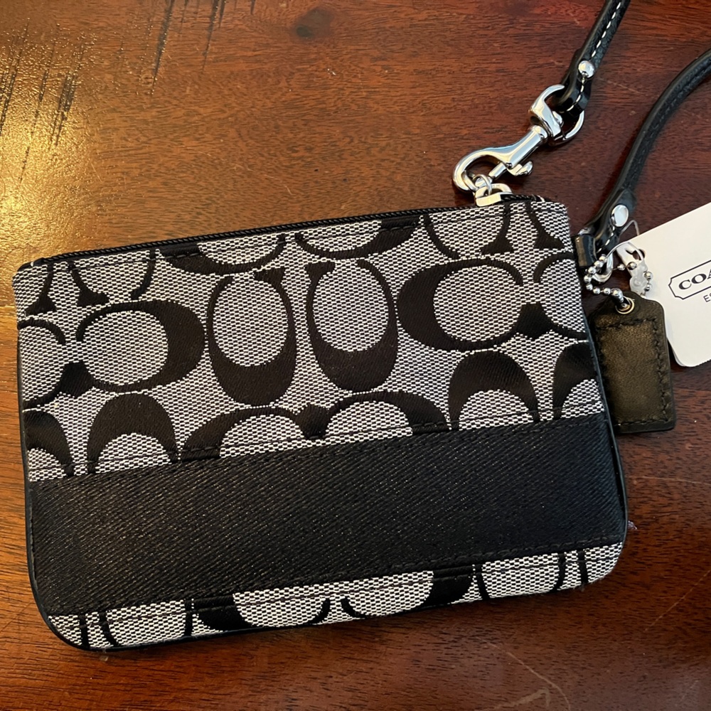 Coach Wristlet black, and white new with tag